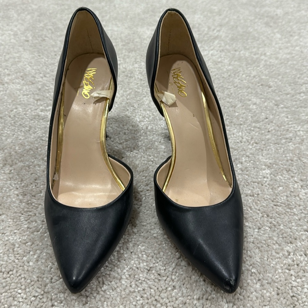 Black pumps, size 6 1/2, barely worn
